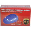 Mini keychain personal alarm with LED light and panic button in retail packaging.